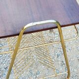 Side table of the 60s mahogany and gold metal range discs