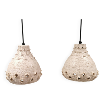 Two ceramic hanging lamps, in creamy white color, looking almost like coral