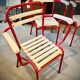 Four TOLIX chairs with armrests
