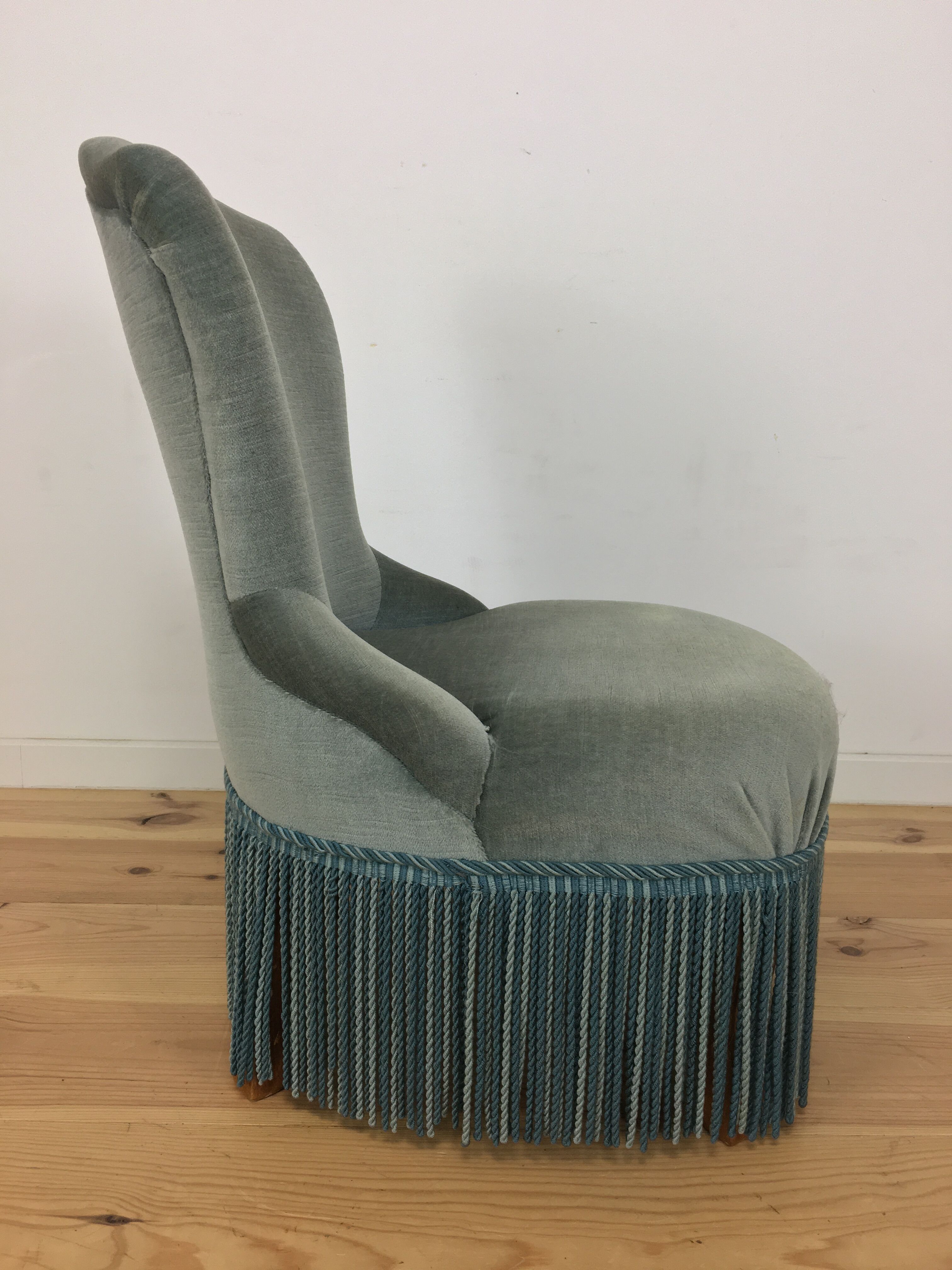 Fauteuil crapaud velours vert à franges