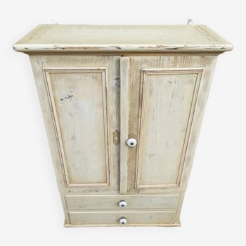 Solid beige wood cabinet with door drawers