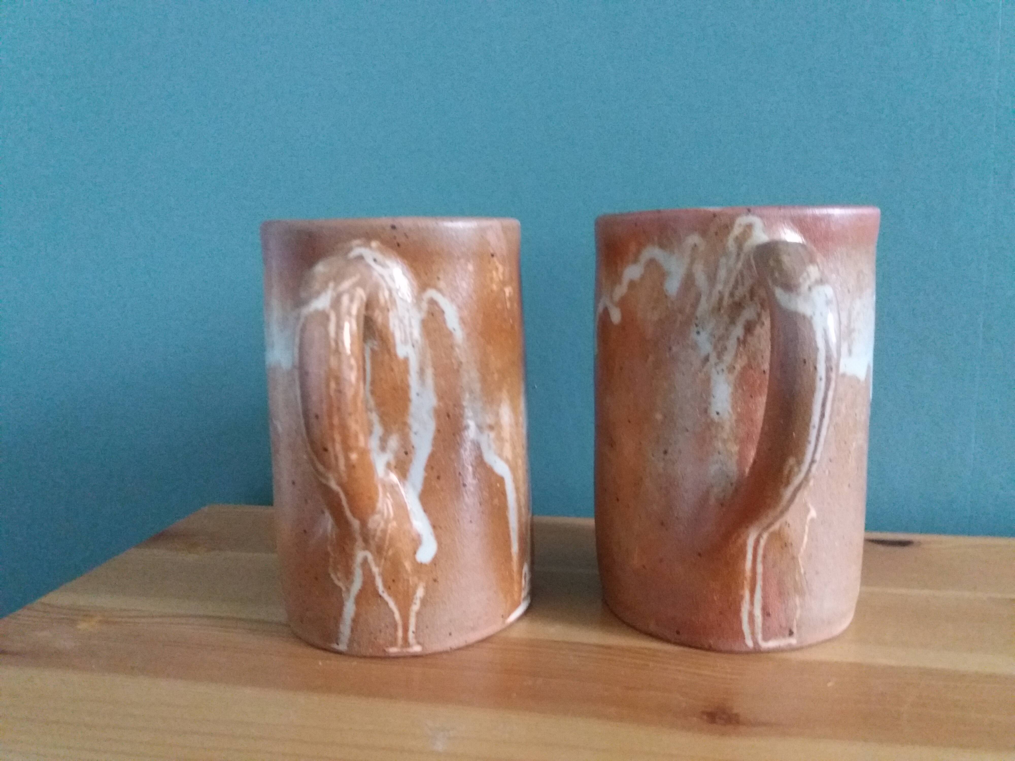 2 enameled stoneware mugs cups