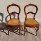 pair of Art Nouveau chairs, cane and faux leather