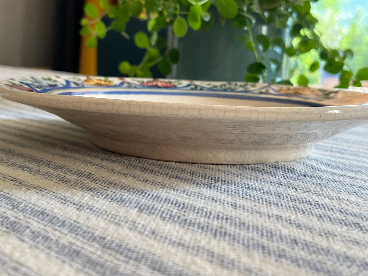 Ceramic plate with bird decoration