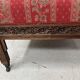 Pair of Gothic-style walnut lounge chairs, 19th century