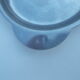 Round earthenware plate in stainless steel