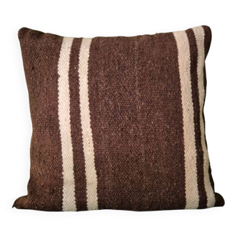 Cushion cover in old Berber blanket.