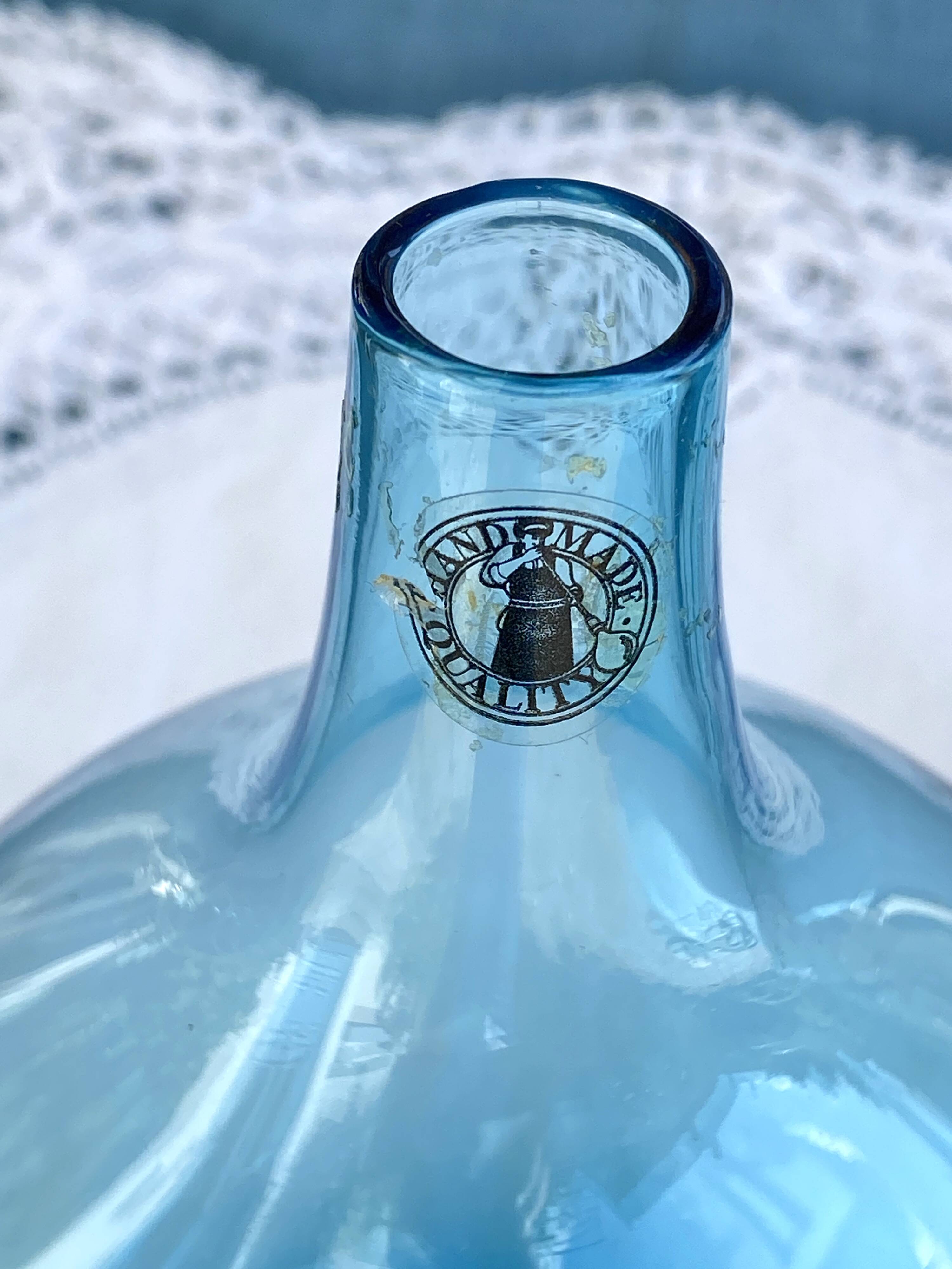 Vintage handmade aqua blue glass bud vase from the 1990s