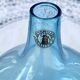 Vintage handmade aqua blue glass bud vase from the 1990s