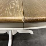 Round extendable oak dining table