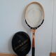 Wooden Dunlop tennis racket with its cover