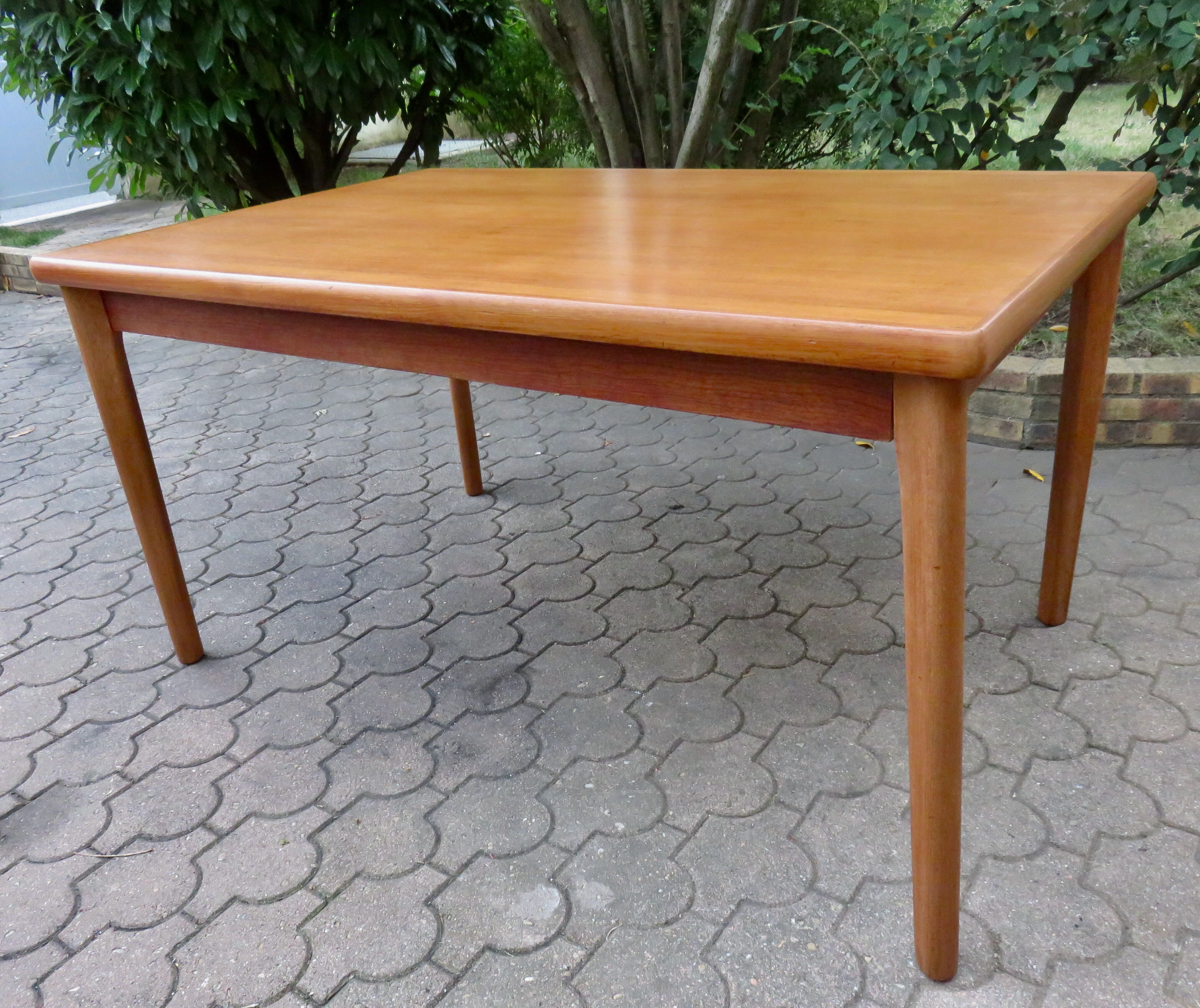 Extendable teak table by Henning Kjaernulf, Denmark 1960