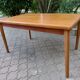Extendable teak table by Henning Kjaernulf, Denmark 1960