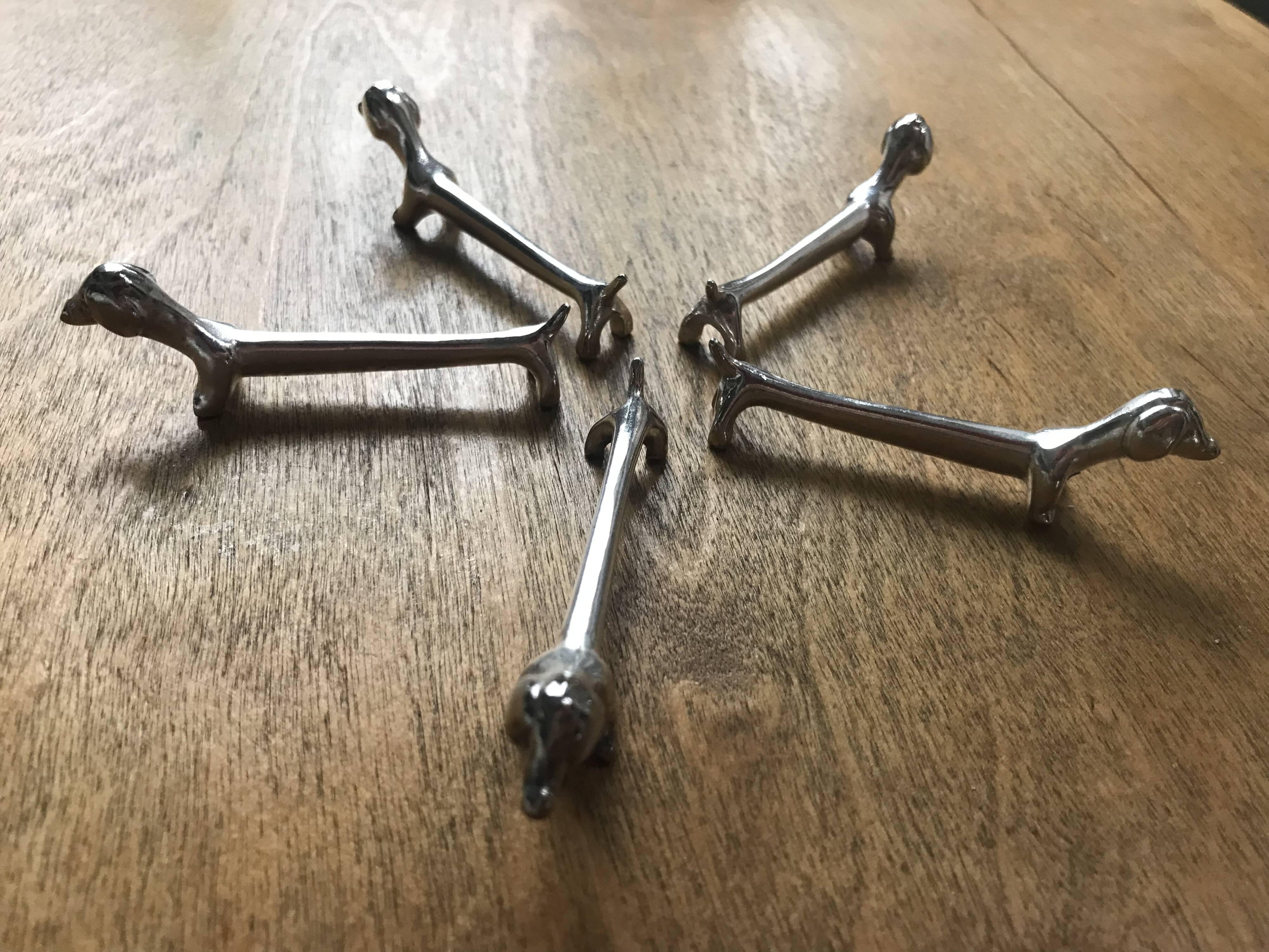 Set of five vintage basset hound knife holders