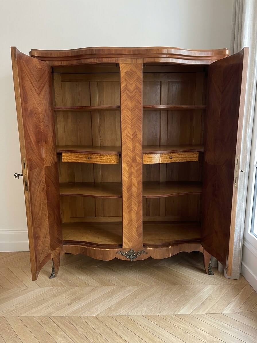 Louis XV wardrobe in floral marquetry and bronze.