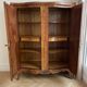 Louis XV wardrobe in floral marquetry and bronze.