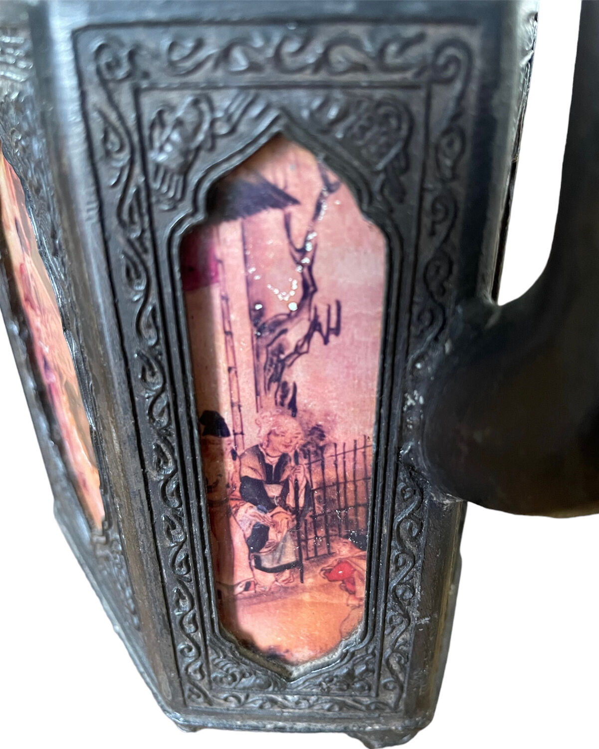 Ancient Asian teapot made of pewter and glass