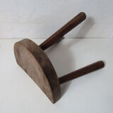 Old half-moon wooden tripod stool