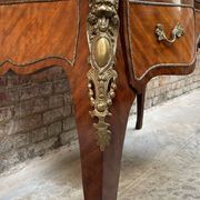 Antique French-style desk with green leather top and bronze mounts