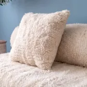 White Moroccan Arabic sofa with a rounded backrest.