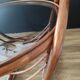 Grande table basse ronde vintage en rotin et verre fumé