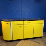 Vintage yellow sideboard, and black marble top.
