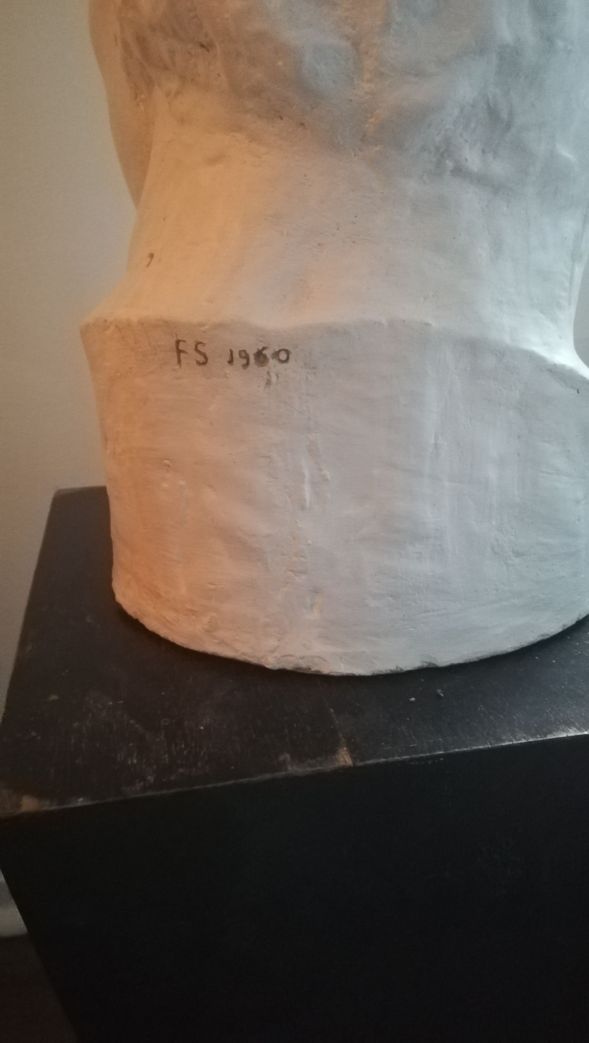 Patinated plaster man head.