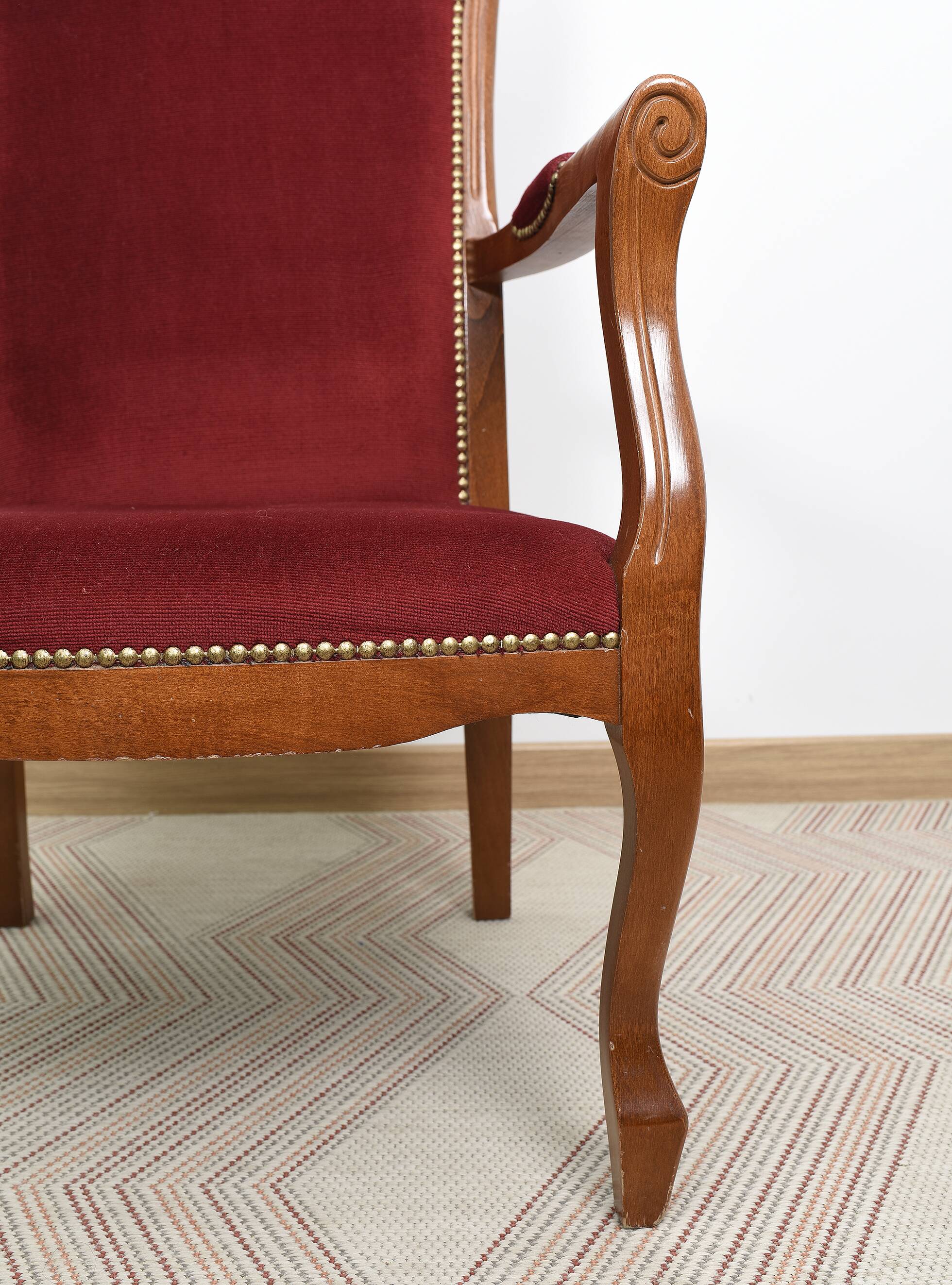 Burgundy Voltaire armchair