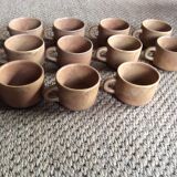 Series of 11 sandstone cups