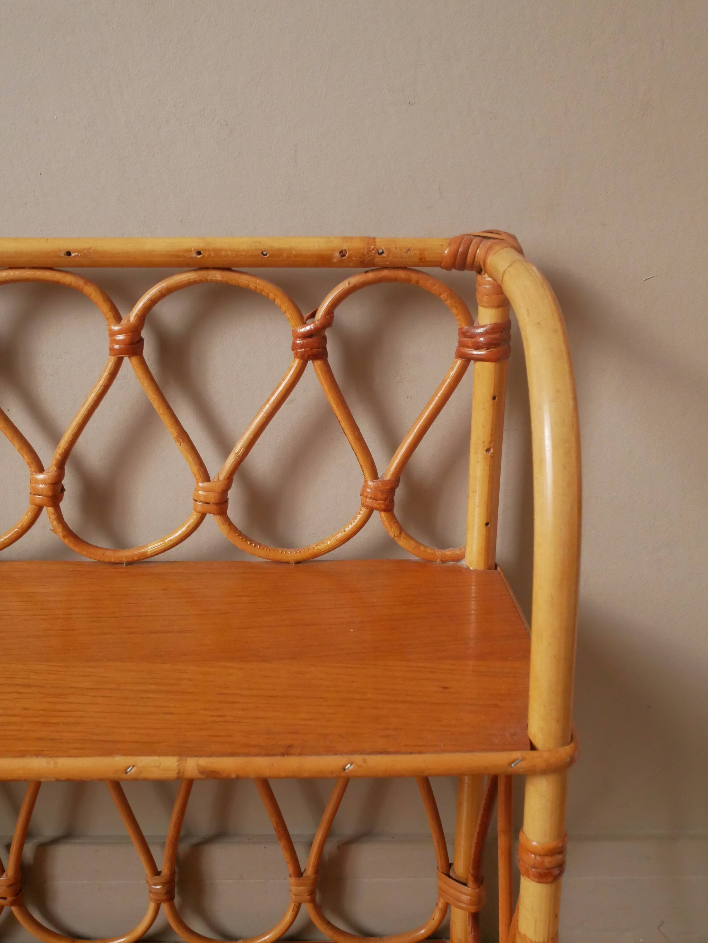 Vintage bamboo wicker rattan shelf unit with Scandinavian country style design for children