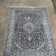 Grand tapis Nain bleu tufté main