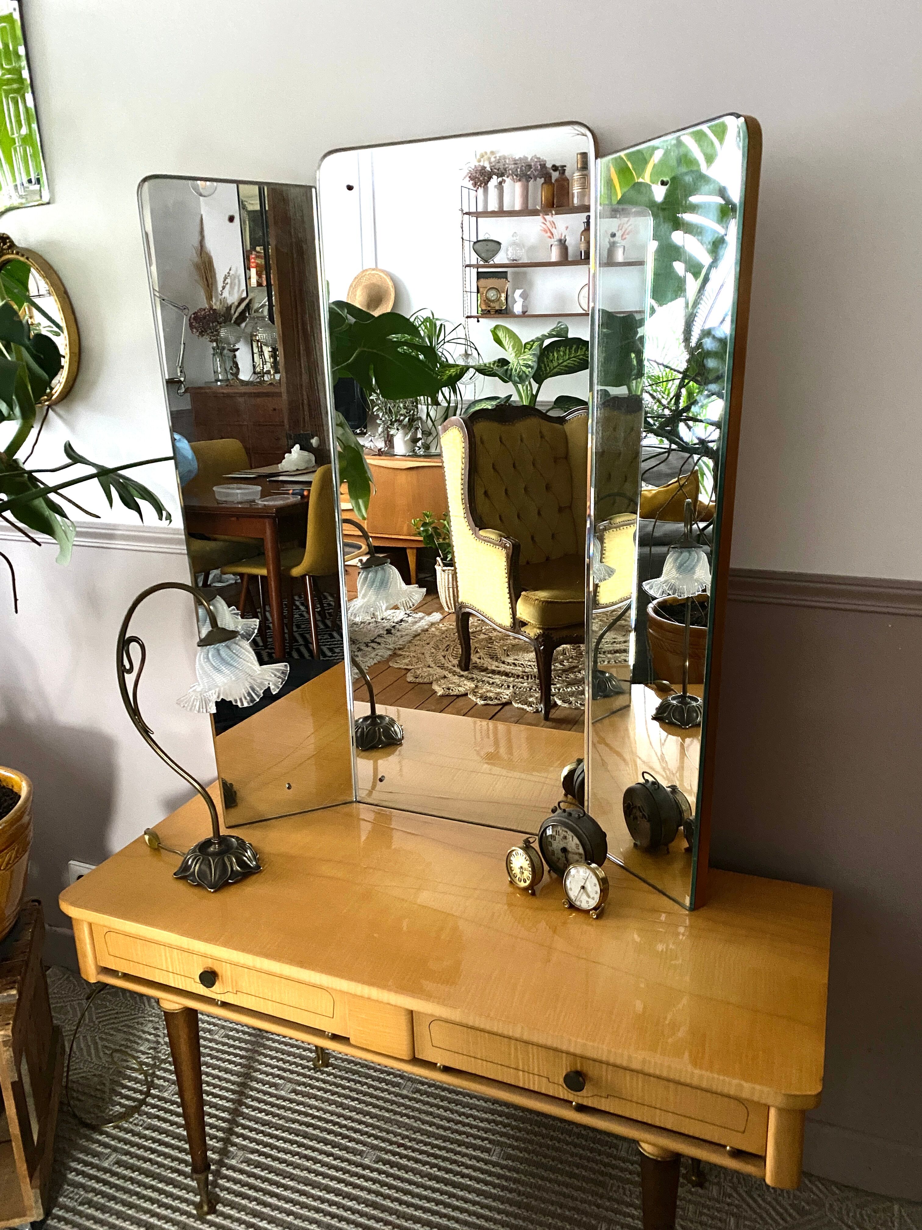 Dressing table in a vintage mirror triptych
