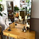 Dressing table in a vintage mirror triptych