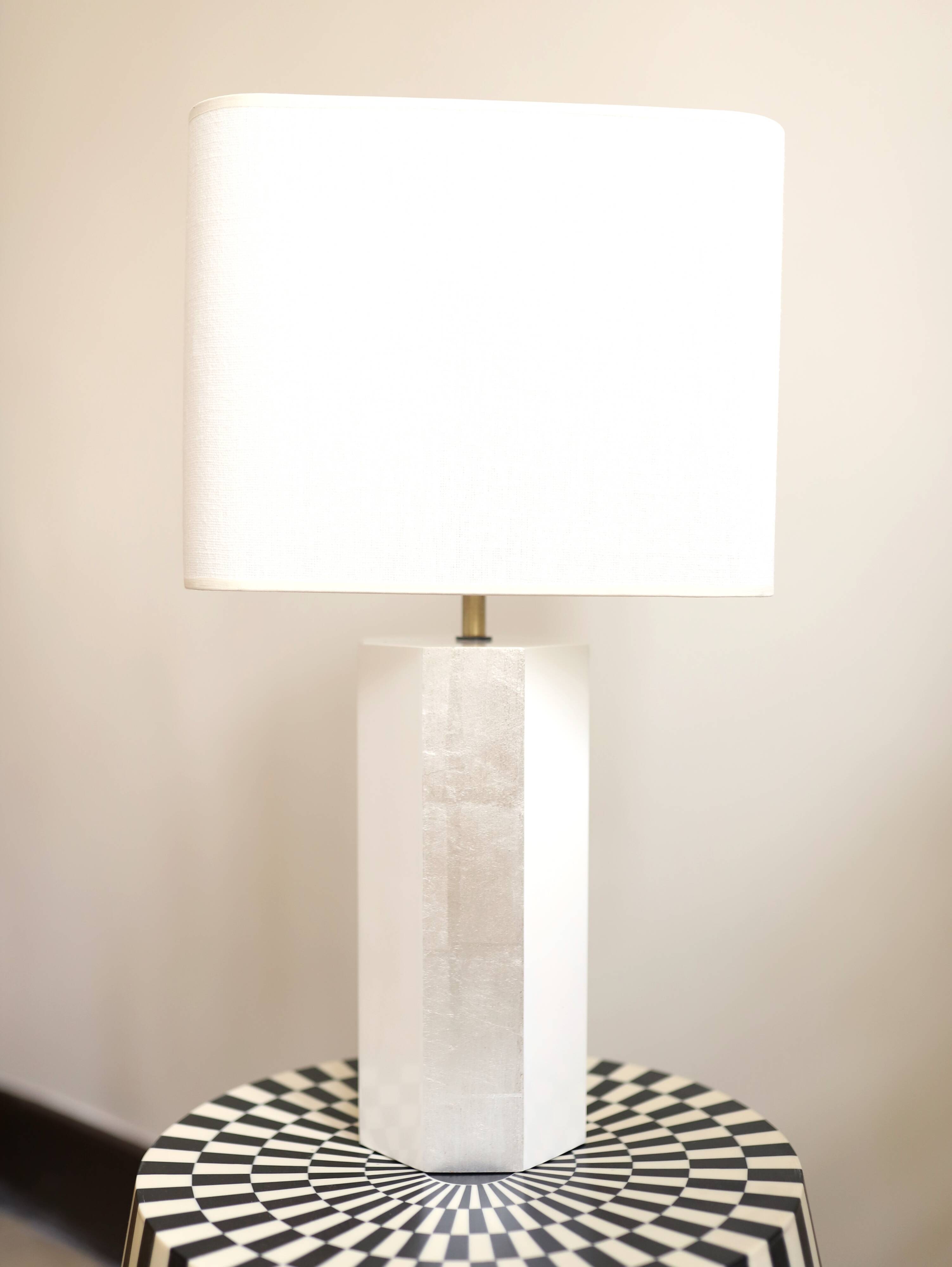 La Luco lamp in white lacquered ash and gold leaf