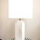 La Luco lamp in white lacquered ash and gold leaf