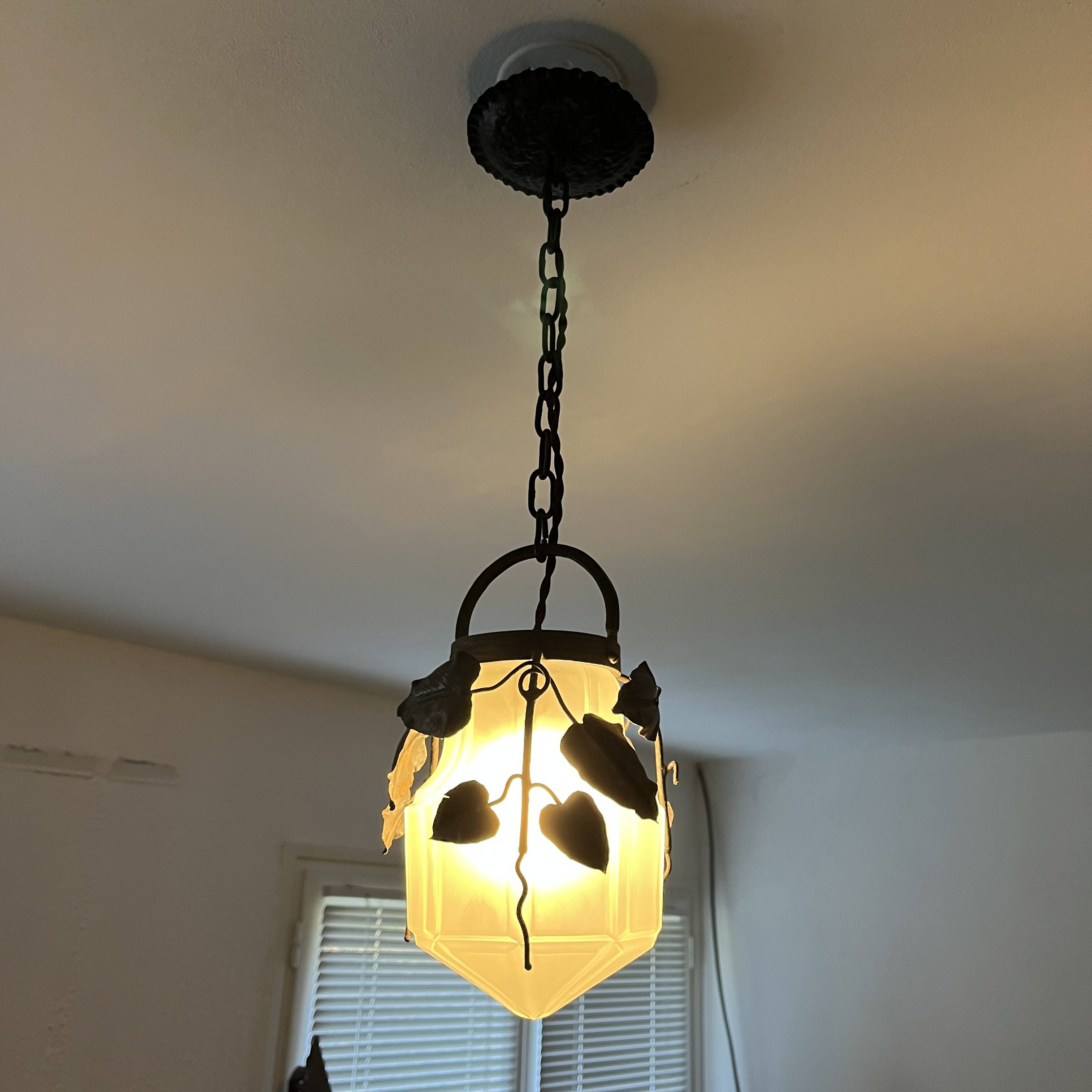 Antique glass and wrought iron pendant light with ivy decor Art Deco chandelier globe