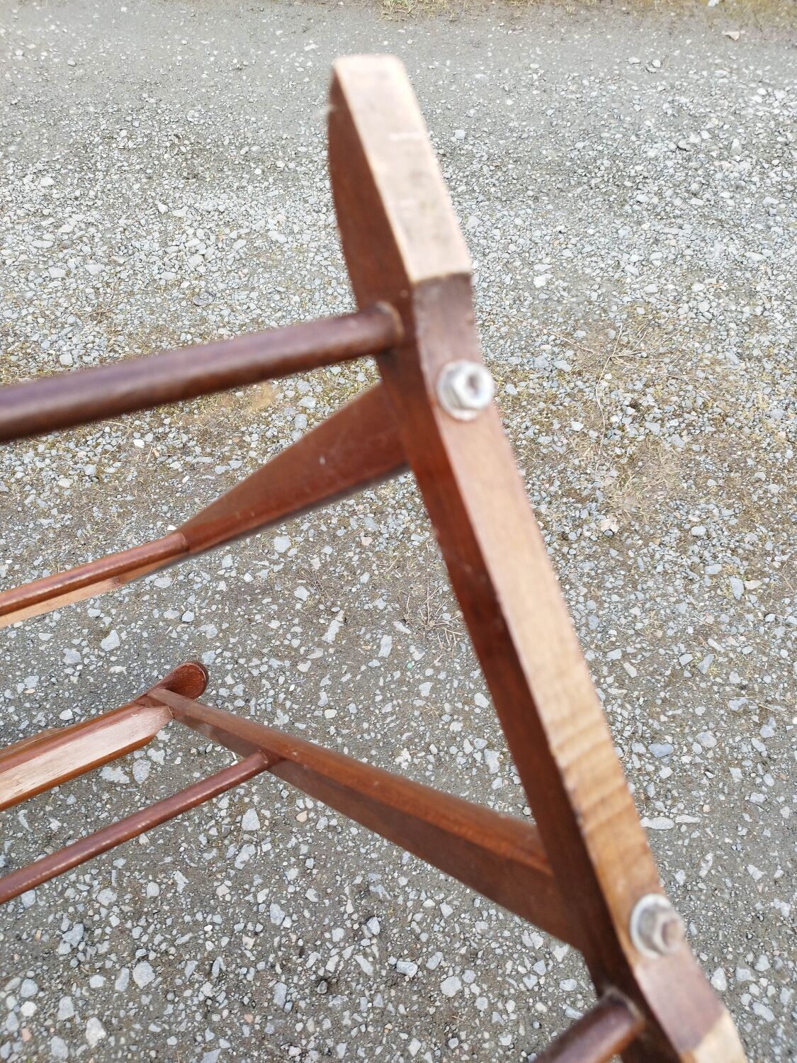 Valet wearing double wood coat rack