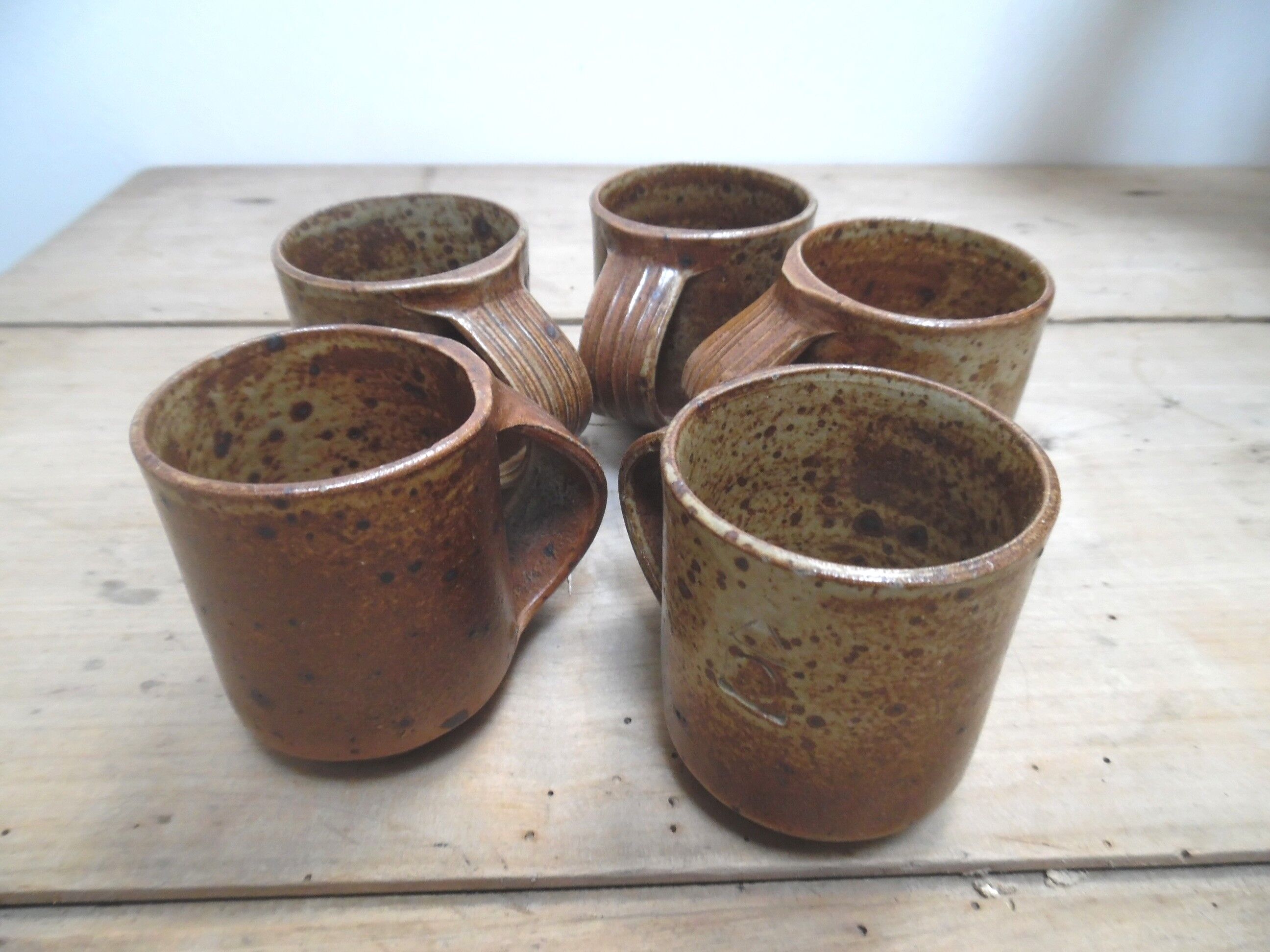 Five cups in stoneware