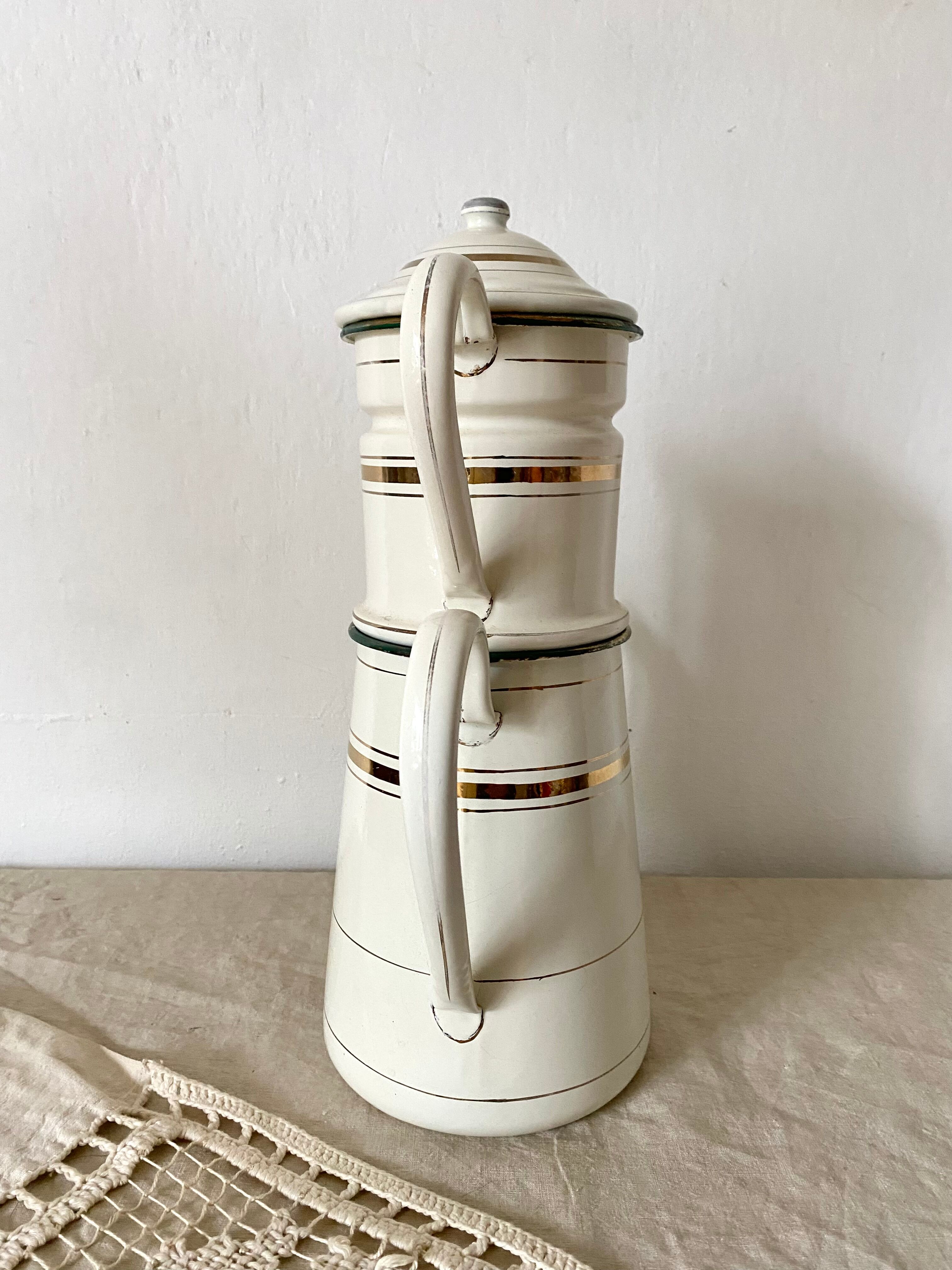 Antique coffee maker in enamelled sheet metal