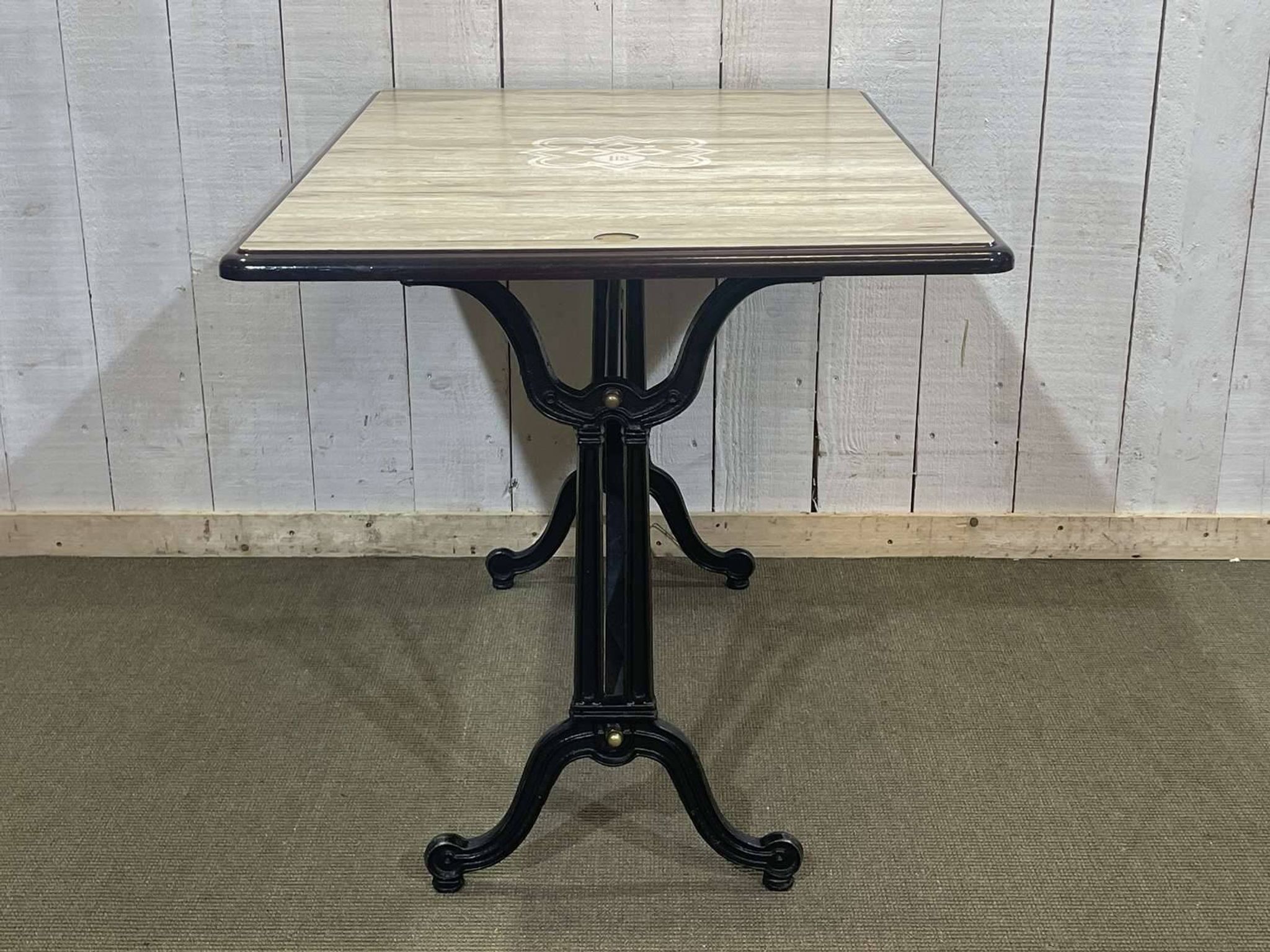 Bistro table - modern work, cast iron base