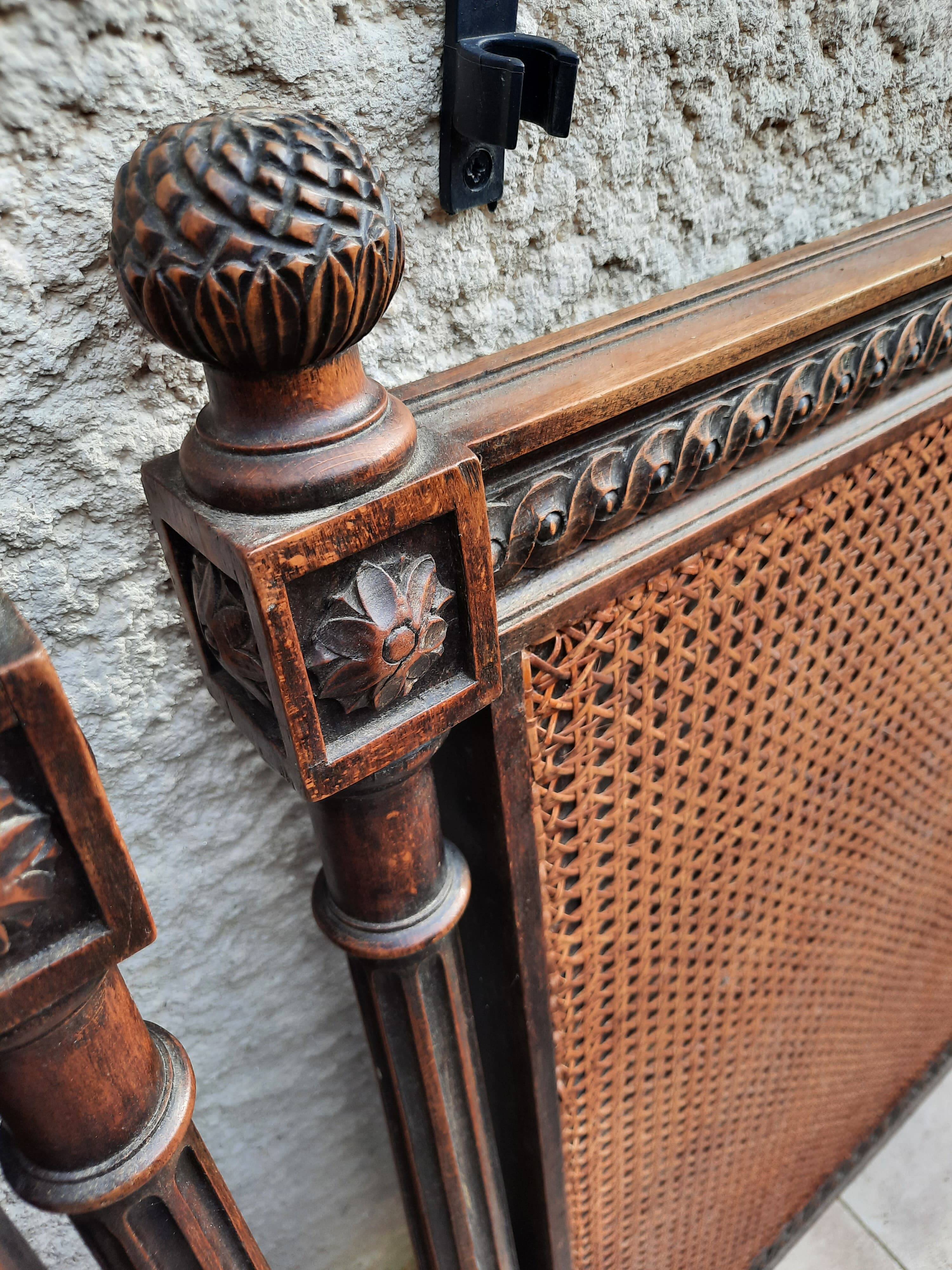 Hand-carved Louis XVI style headboards with chic vintage caning (1800s)