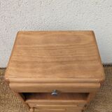 Vintage bedside table with compass legs