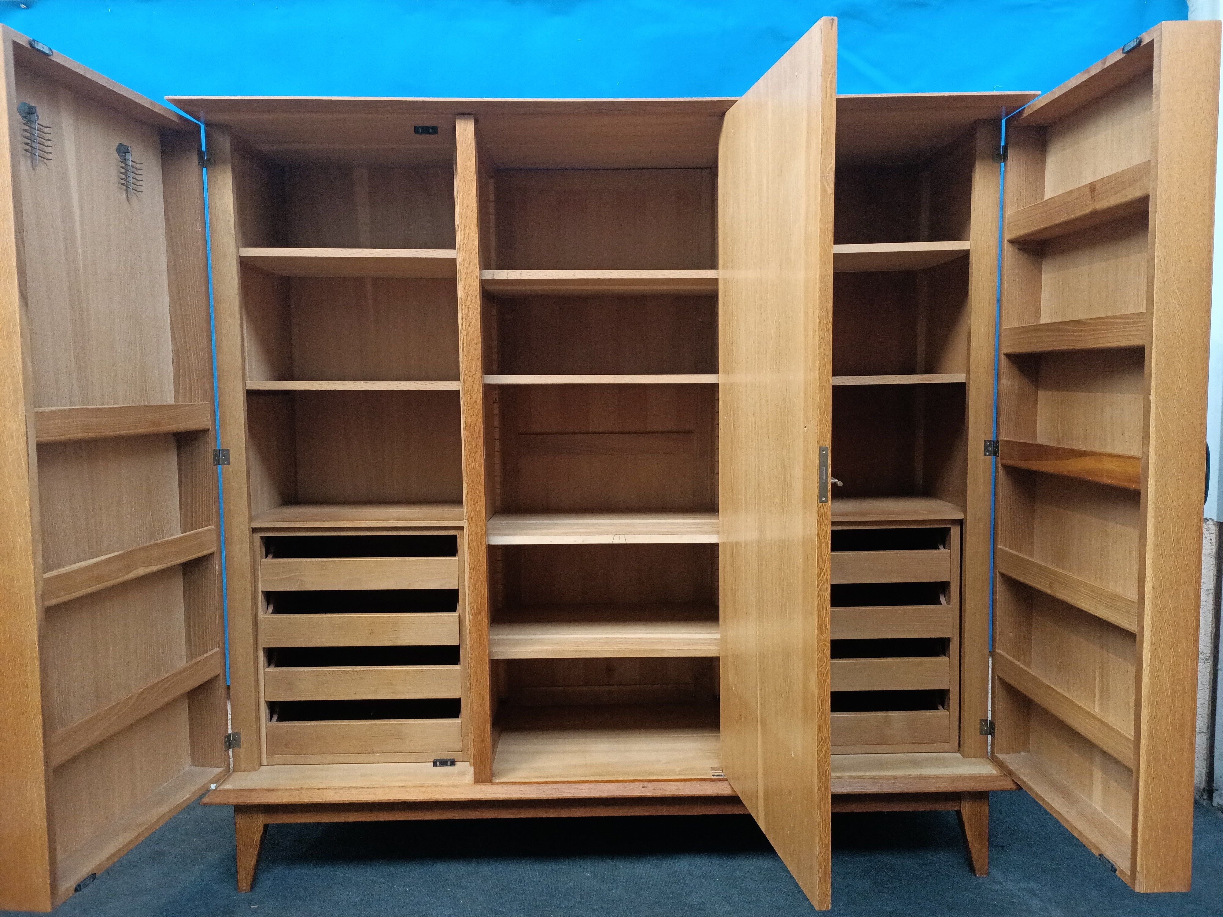 Vintage compass foot cabinet