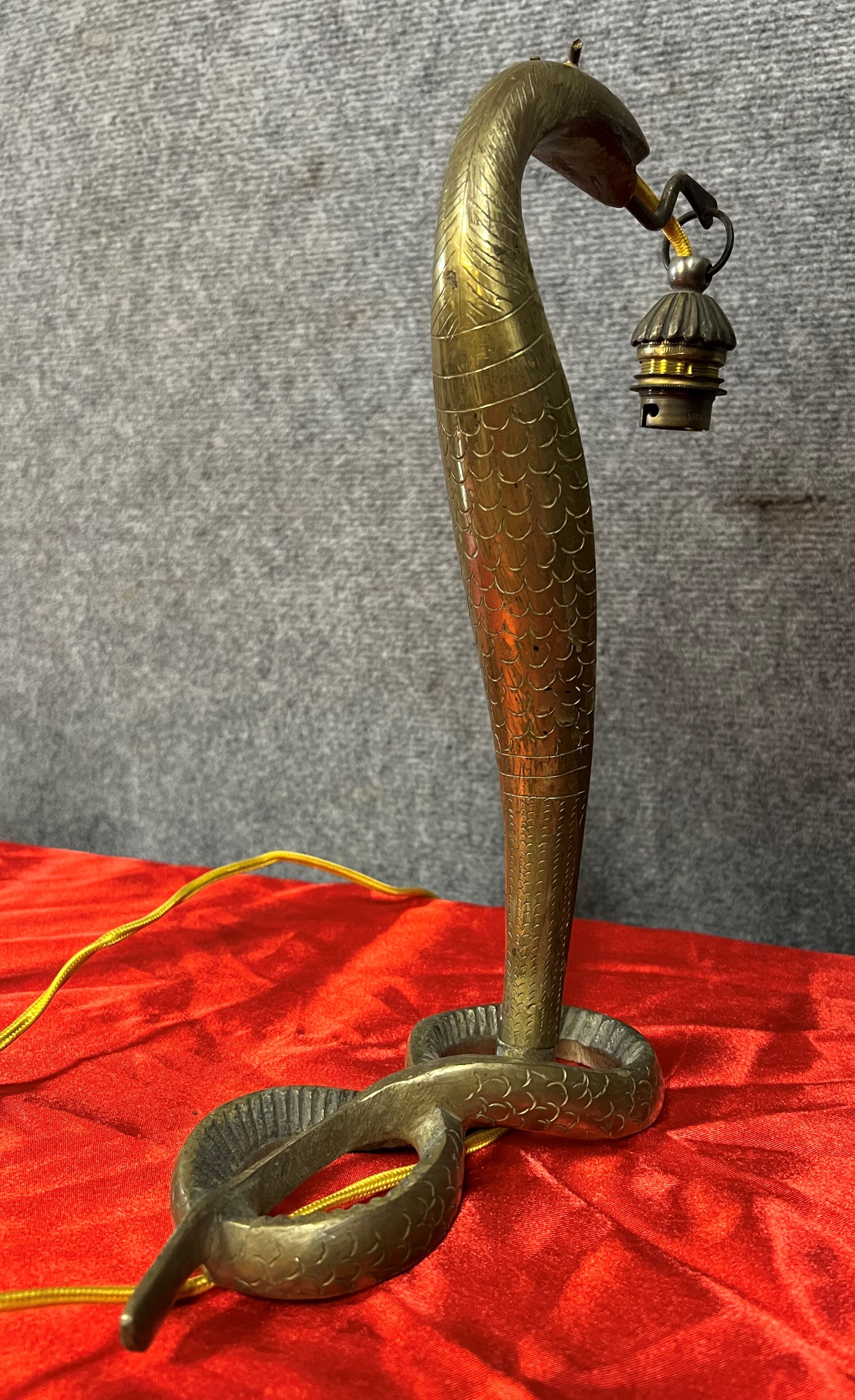 Pair of cobra lamps in gilded bronze