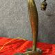 Paire de lampes cobra en bronze doré