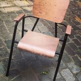 Old chair with armrest restored in metallic pink