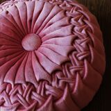 Pink braided rosette velvet cushion
