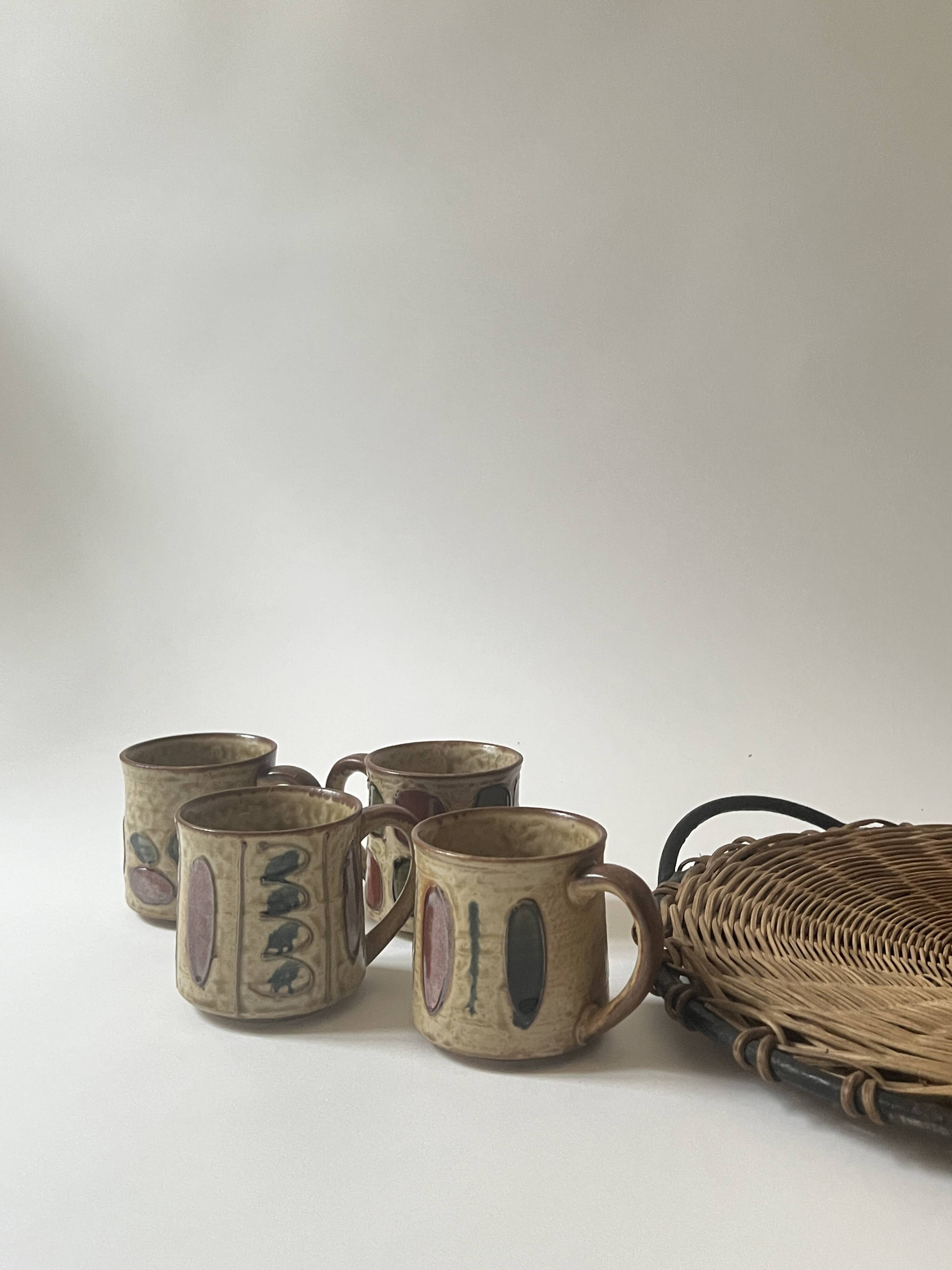 Set of 2 glazed ceramic coffee mugs from around 1970.