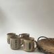 Set of 2 glazed ceramic coffee mugs from around 1970.