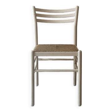 modernist chair in white wood and straw